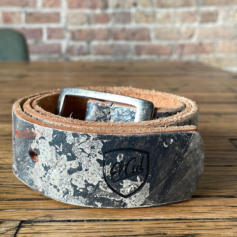 Leather belt with snakeskin appearance by Argentinian boutique El Cid.